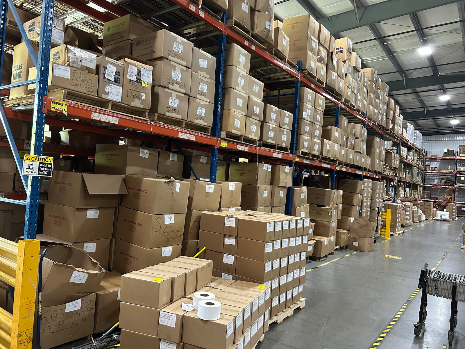 Shelves are lined with products at Crane Consumables in Monroe. RICK McCRABB/CONTRIBUTOR