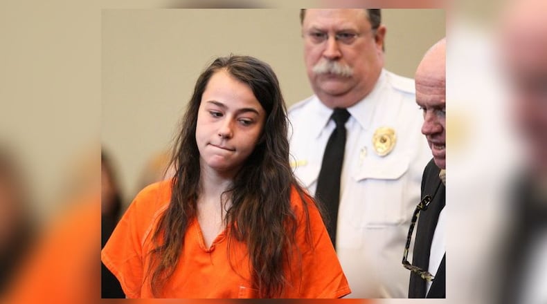 Misty Williams pleaded guilty to murder, aggravated robbery and aggravated burglary, for her part in the botched robbery and shooting death of Julian Slaven. She was sentenced Monday to 18 years to life in prison. FILE