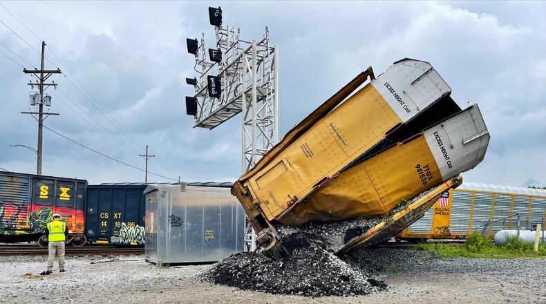 Four train cars derailed and blocked crossings in multiple areas of Hamilton in the morning of Friday, May 27, 2022. This happened at Walnut and Seventh street. MANDY GAMBRELL/STAFF