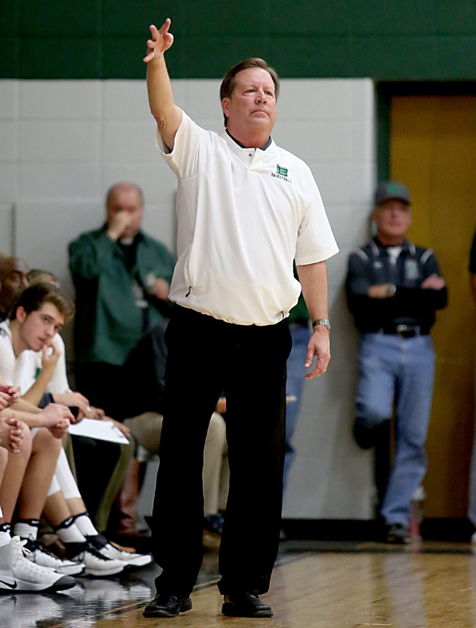 Badin coach Gerry Weisgerber calls a play during Wednesday night’s game against Northwest at Mulcahey Gym in Hamilton. CONTRIBUTED PHOTO BY E.L. HUBBARD
