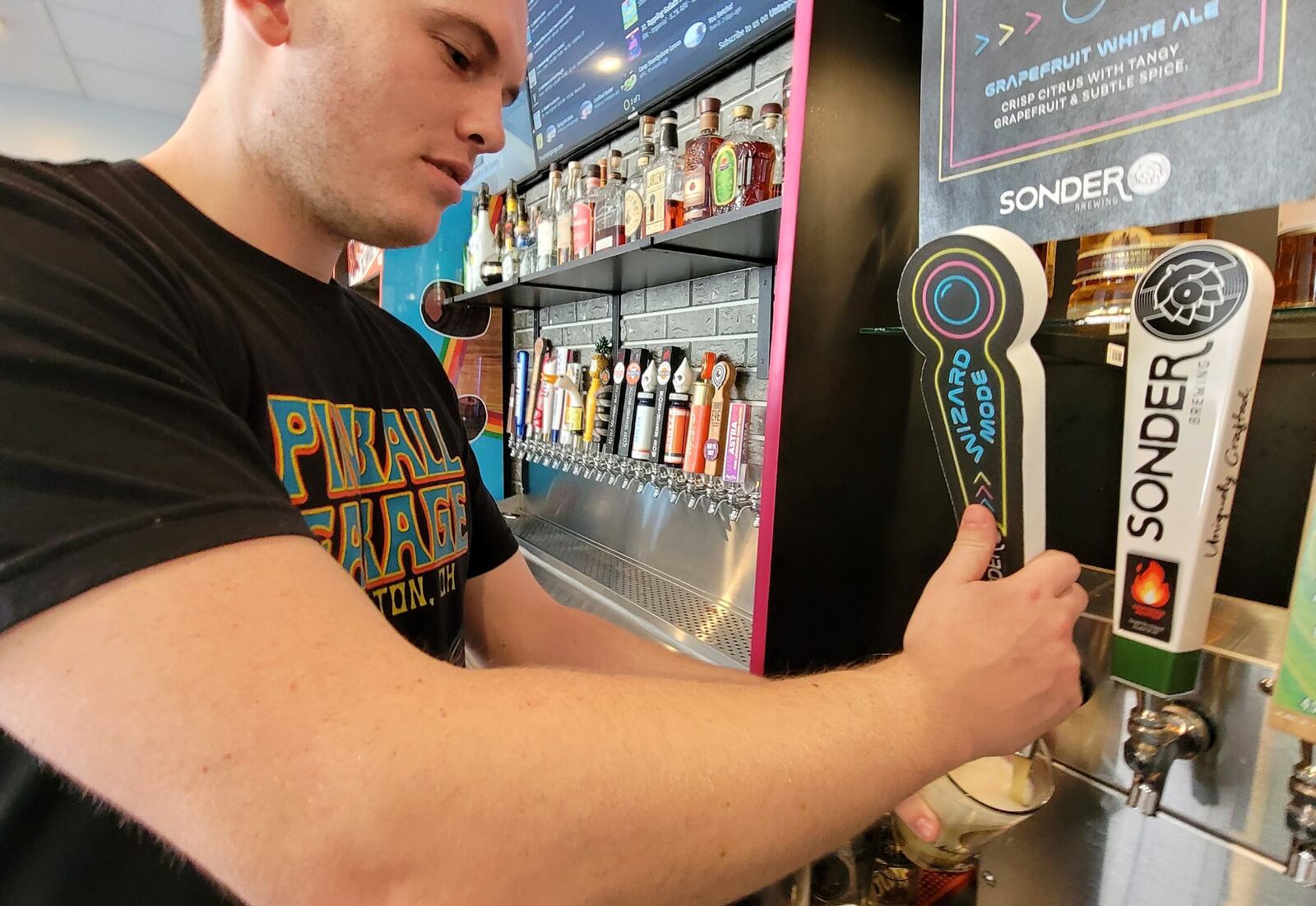 Pinball Garage in Hamilton has a new beer on tap, a collaboration with Sonder Brewing in Mason. The beer is Wizard Mode grapefruit white ale, a crisp citrus with tangy grapefruit and subtle spice. NICK GRAHAM / STAFF