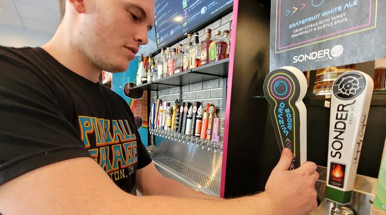 Pinball Garage in Hamilton has a new beer on tap, a collaboration with Sonder Brewing in Mason. The beer is Wizard Mode grapefruit white ale, a crisp citrus with tangy grapefruit and subtle spice. NICK GRAHAM / STAFF