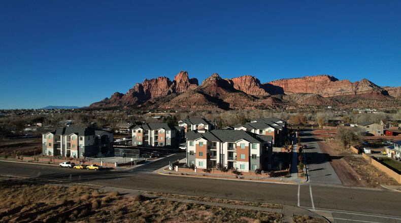 A modern apartment building is shown Friday, Dec. 5, 2025, in Colorado City, Ariz. (AP Photo/Rick Bowmer)