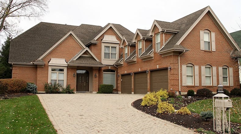 The 4-bedroom home has about 4,540 sq. ft. of living space. Finished space above the 3-car garage allows for multiple uses, including a recreation room or bedroom suite as there is a full bathroom as well. CONTRIBUTED PHOTOS BY KATHY TYLER