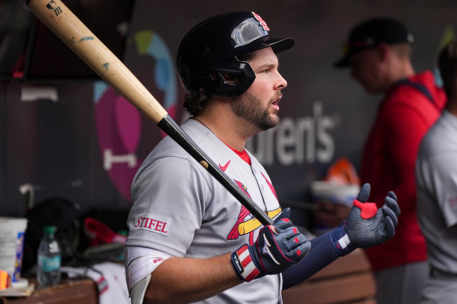 St. Louis Cardinals' Alec Burleson reacts after umpires ruled Masyn Winn out after attempting to steal second base during the eighth inning of the first baseball game of a doubleheader against the Cincinnati Reds, Wednesday, April 30, 2025, in Cincinnati. (AP Photo/Jeff Dean)