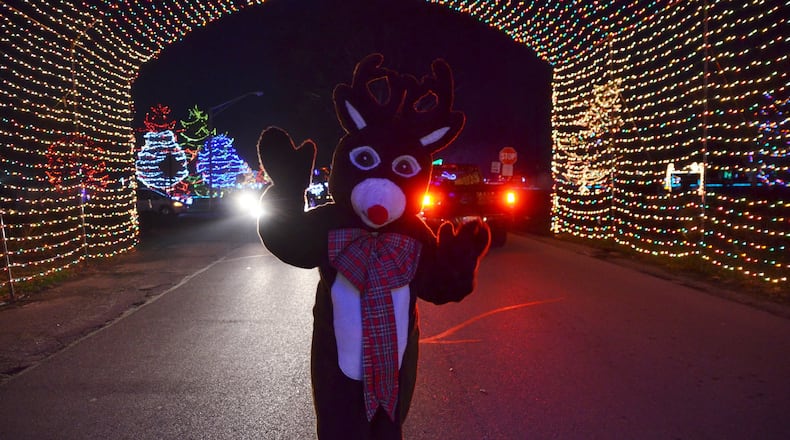One of the costumed characters was on hand to entertain guests at Light Up Middletown, which will be open through New Year’s Eve. CONTRIBUTED