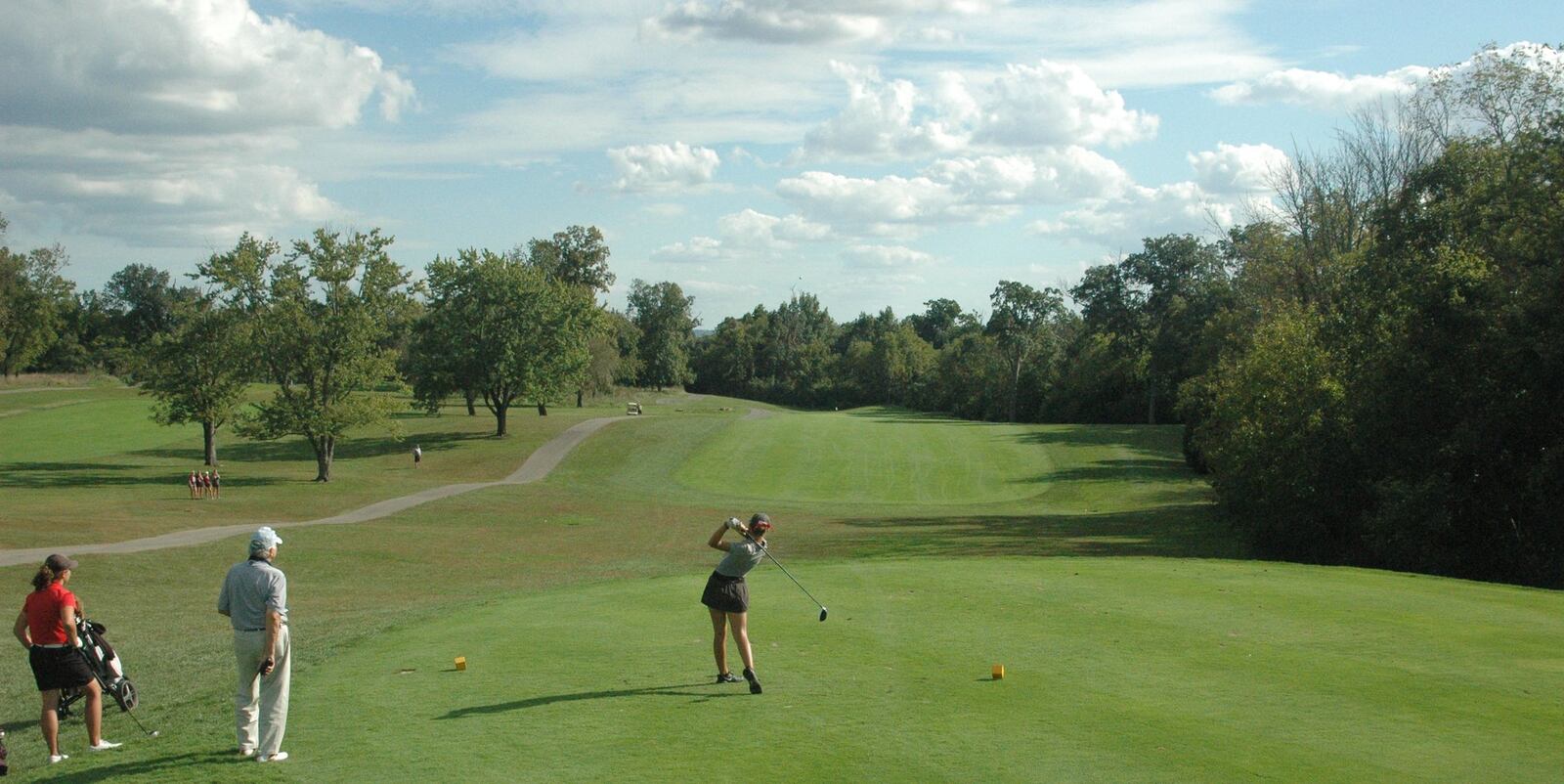 Lebanon’s Maddie Owens tees off for her first shot during a playoff with Colerain’s Alex Schutte on Tuesday at the Division I district girls golf tournament at Glenview Golf Course. Schutte won the one-hole playoff to earn the last individual state-qualifying spot. RICK CASSANO/STAFF