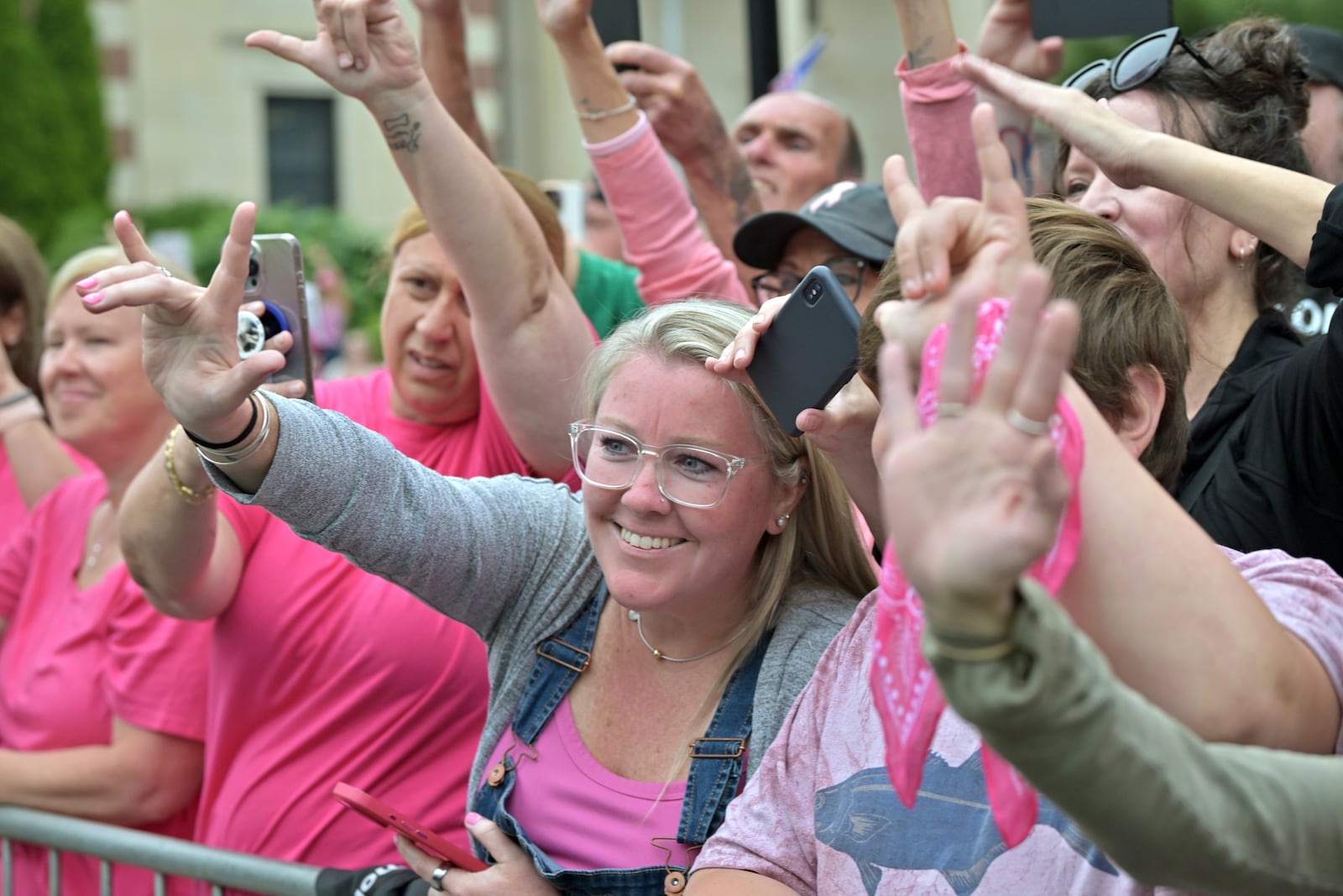 Nichole Tellier, a resident of Cape Cod, Mass., center, and fellow supporters of Karen Read, react as she leaves the courthouse at the start of the third day of jury deliberations in Read's trial at Norfolk Superior Court, Wednesday, June 18, 2025, in Dedham, Mass. (AP Photo/Josh Reynolds)