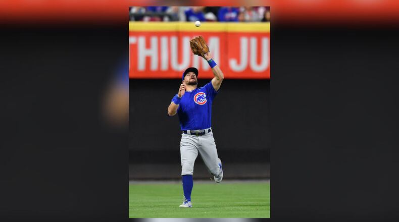 CINCINNATI, OH - MAY 14: Kyle Schwarber #12 of the Chicago Cubs catches a fly ball for an out in the ninth inning against the Cincinnati Reds at Great American Ball Park on May 14, 2019 in Cincinnati, Ohio. Chicago defeated Cincinnati 3-1. (Photo by Jamie Sabau/Getty Images)