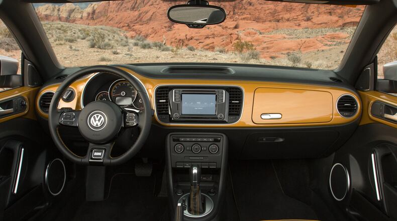 The interior repeats the special paint color with it appearing all along the dashboard and side panels as well as in the stitching of the leather seats. Photo by Volkswagen