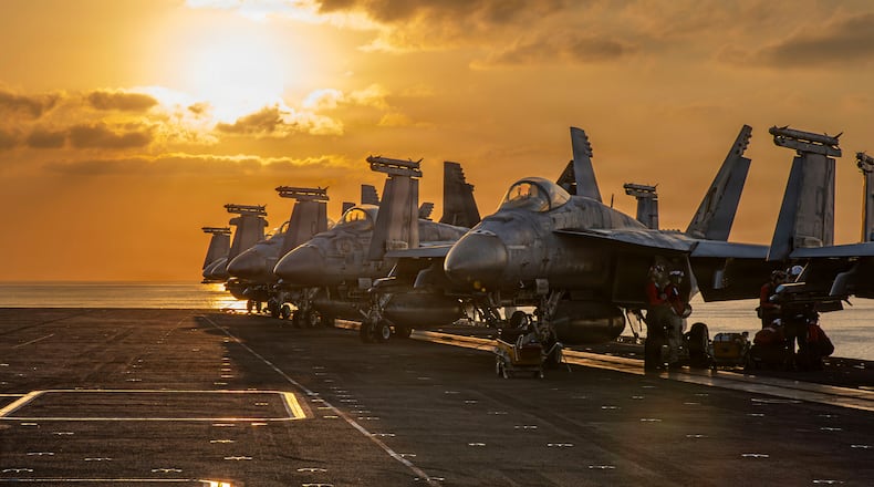 This image provided by U.S. Central Command shows aircraft on the flight deck of the USS Abraham Lincoln (CVN 72) that are operating in support of the war in Iran, on Tuesday, March 3, 2026. (U.S. Navy via AP)