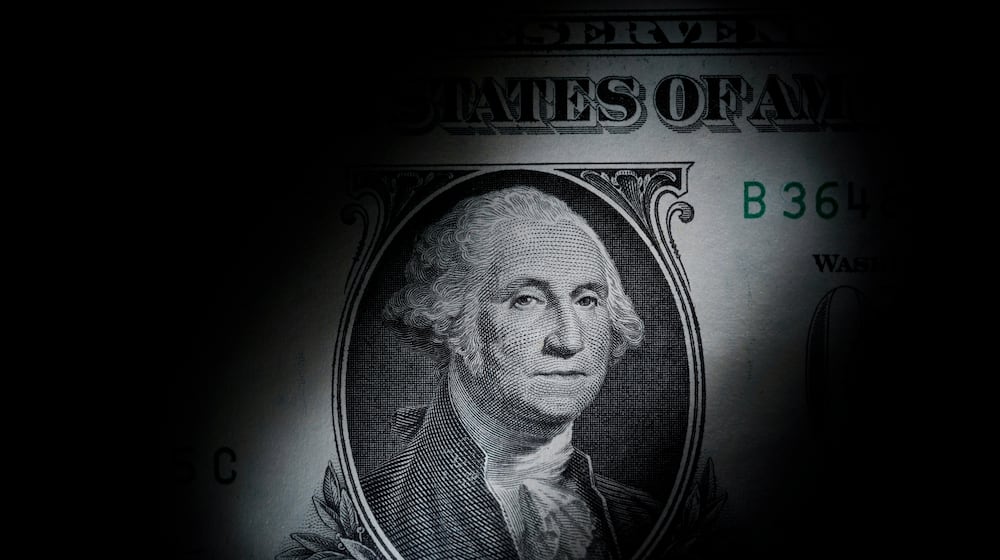 FILE - The likeness of George Washington is seen on a U.S. one dollar bill, March 13, 2023, in Marple Township, Pa. (AP Photo/Matt Slocum, File)