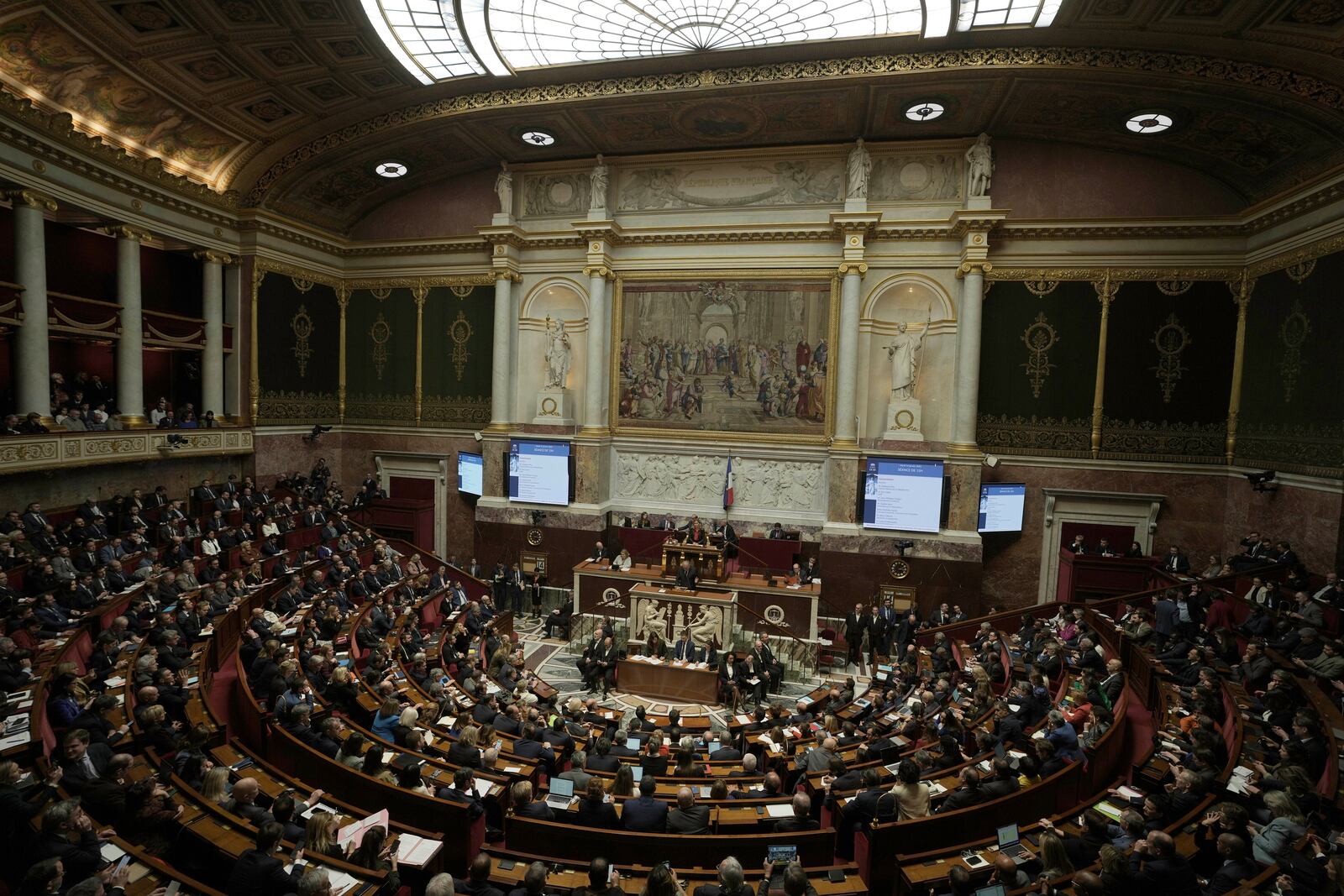 FILE - Lawmakers listen to French Prime Minister Francois Bayrou delivering his general policy speech, Jan. 14, 2025 at the National Assembly in Paris. (AP Photo/Thibault Camus, file)