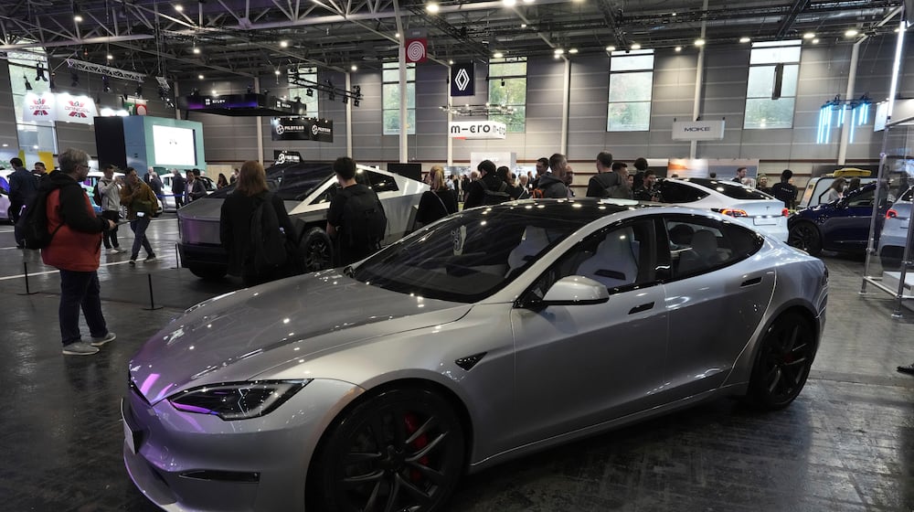FILE - A Tesla Model S is pictured at the Paris Auto Show, in Paris, Oct. 14, 2024. (AP Photo/Michel Euler, File)