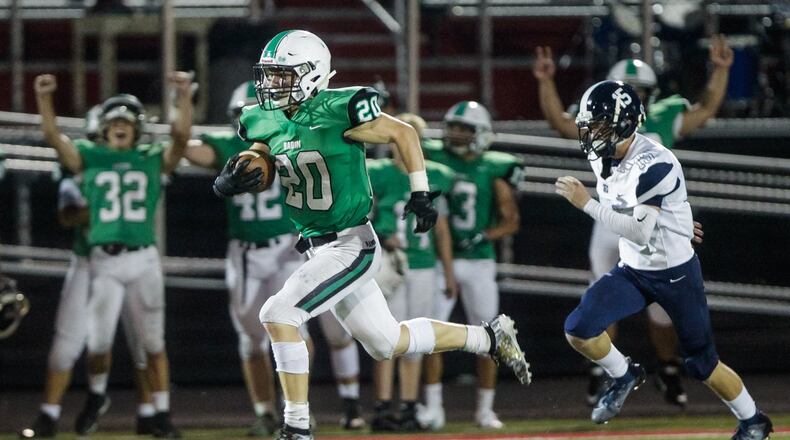 Badin’s Alex DeLong runs for a touchdown during the second half of their football game against Edgewood Friday, Sept. 13 at Fairfield stadium in Fairfield. Badin won 27-0. NICK GRAHAM/STAFF