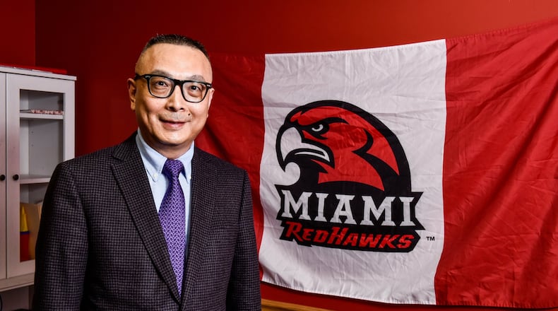 Jian Bo Zhang, CEO of Quest Holdings International, a hub for Chinese students studying at Miami regional campuses, stands inside the Quest Holdings building on Roosevelt Boulevard in Middletown Thursday, March 1 in Middletown. Quest provides dining and housing, and other services for students. NICK GRAHAM/STAFF