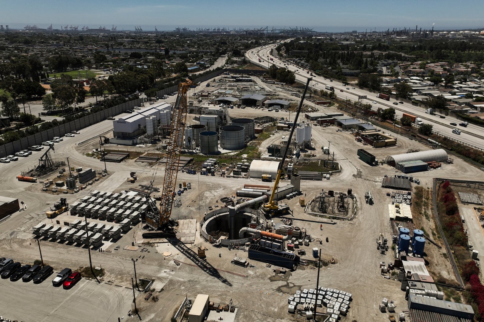 An aerial view shows the only entrance to an industrial tunnel in the Wilmington neighborhood of Los Angeles, Thursday, July 10, 2025, after a section of the tunnel partially collapsed Wednesday night. (AP Photo/Jae C. Hong)