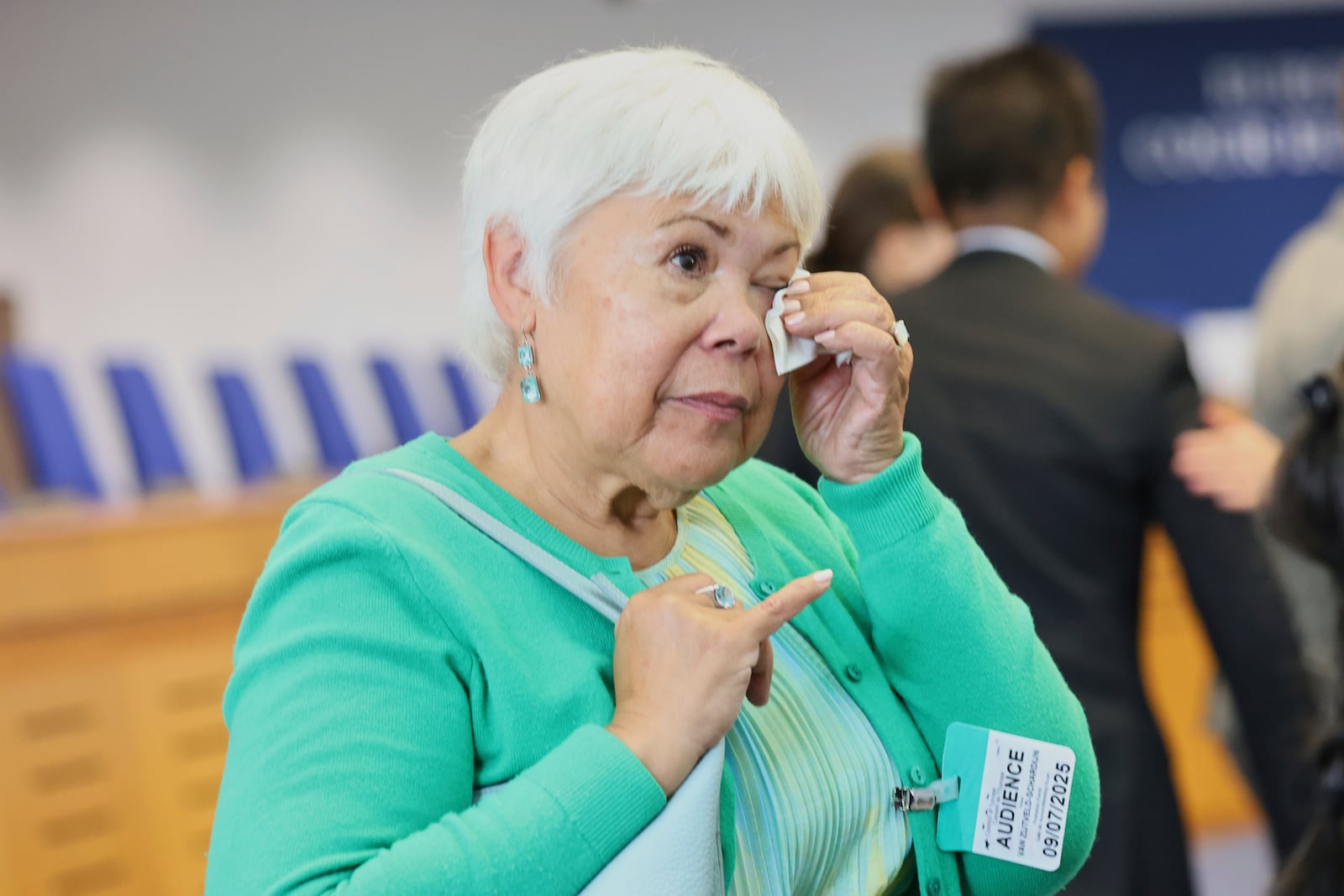 Netherlands' Grace van Zijtveld-Schardijn reacts after the European Court of Human Rights issued its judgment on Russian violations in Ukraine since 2014, including the downing of Malaysia Airlines flight MH17, Wednesday, July 9, 2025 in Strasbourg, eastern France. (AP Photo/Antonin Utz)