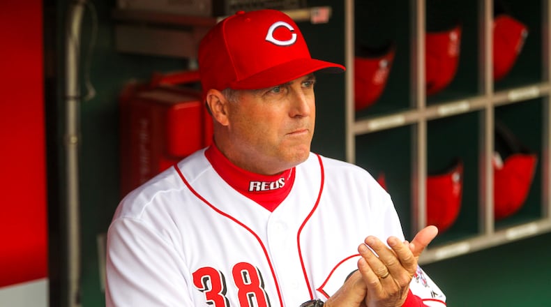Reds manager Bryan Price in the Reds dugout prior to their Opening Day game against the Phillies, Monday, Apr. 3, 2017. GREG LYNCH / STAFF