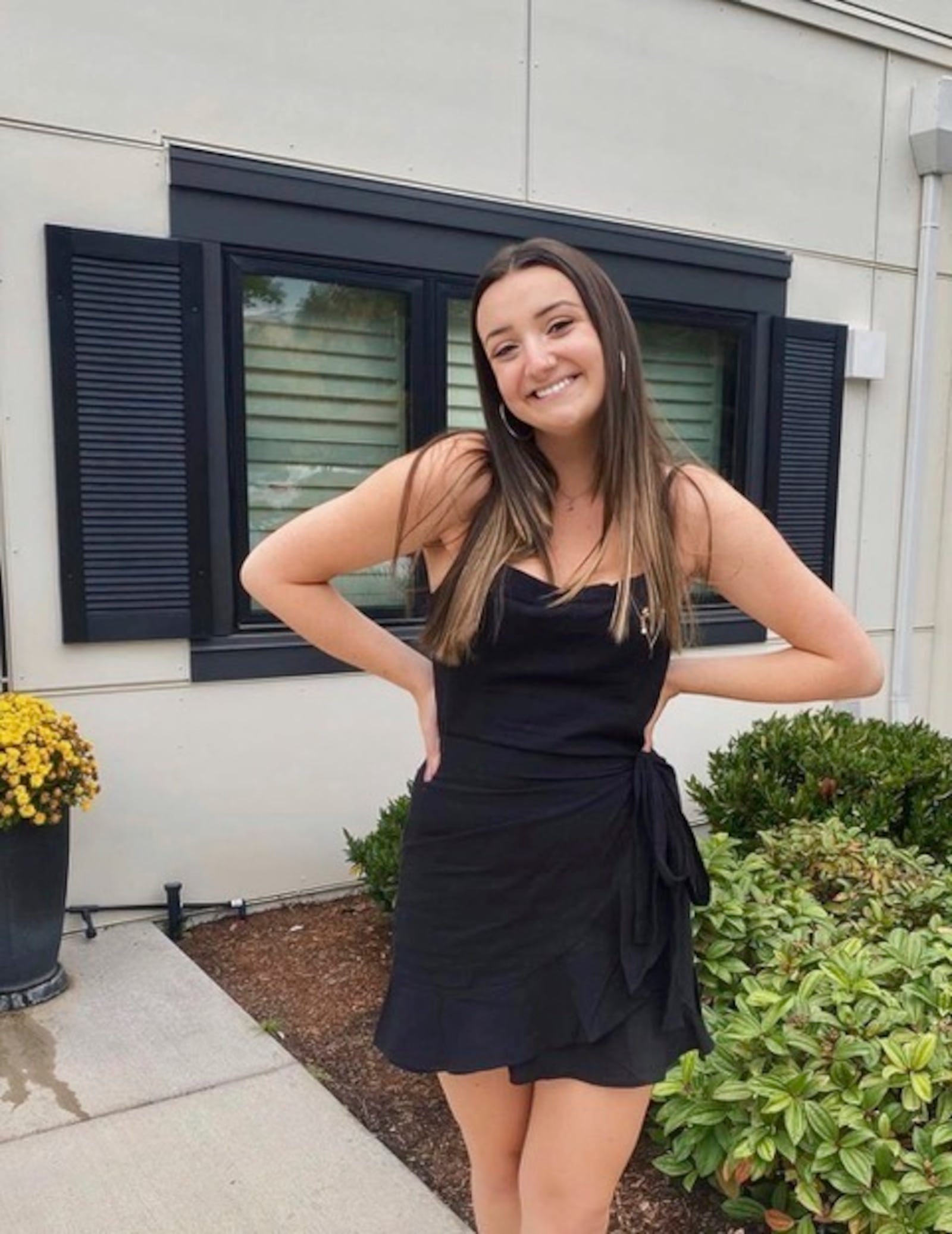 This undated photo released by the family of Emma Huke shows her posing for a photo. (Courtesy The Huke Family via AP)