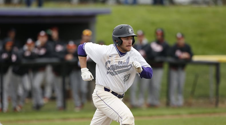 Tyler Gibbons runs to first base while playing for Capital University. Photo by Joe Maiorana