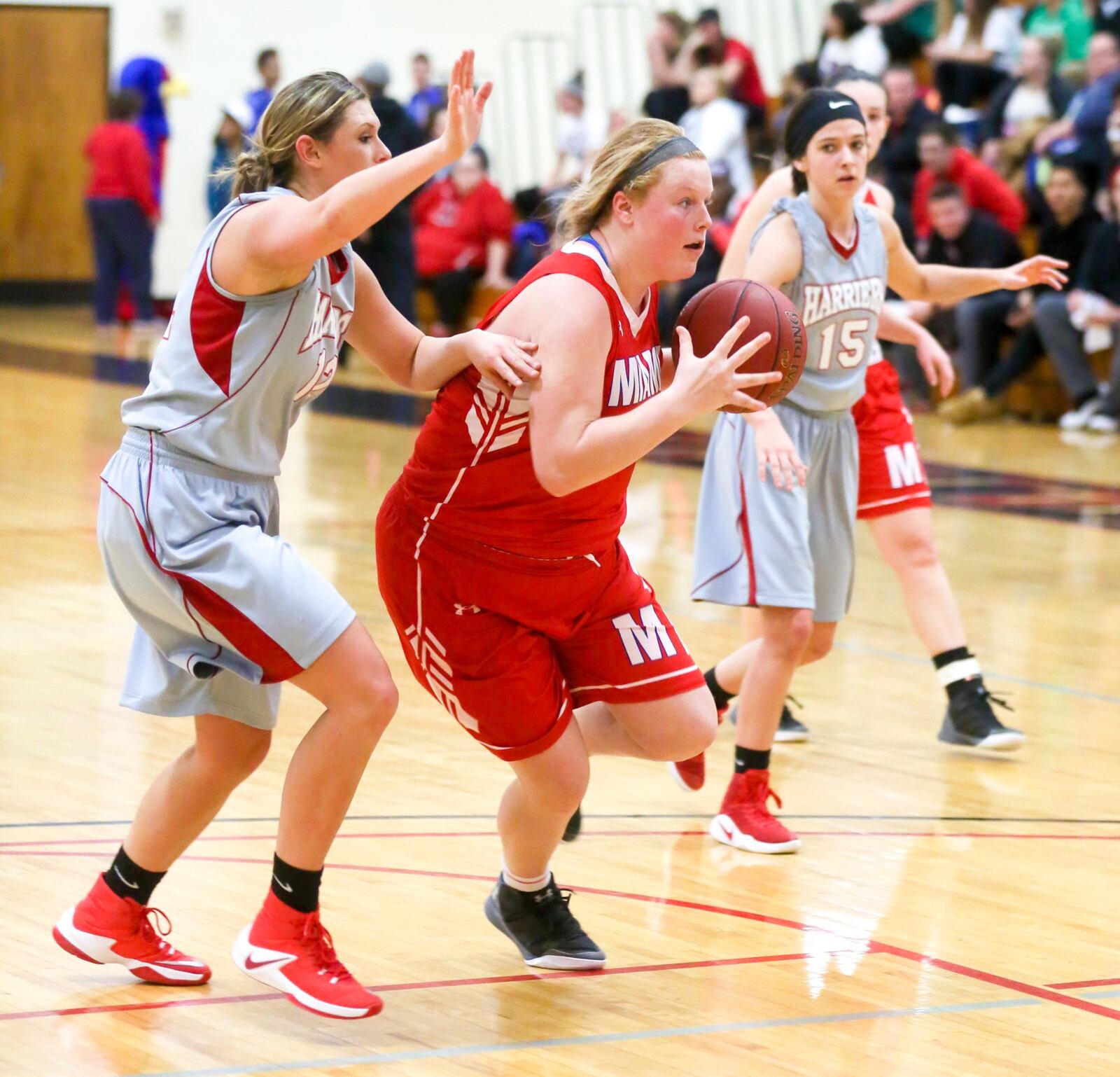 Miami Middletown forward Kayla Shields (33) drives the lane during a game at Miami Hamilton on Feb. 8, 2017. GREG LYNCH/STAFF