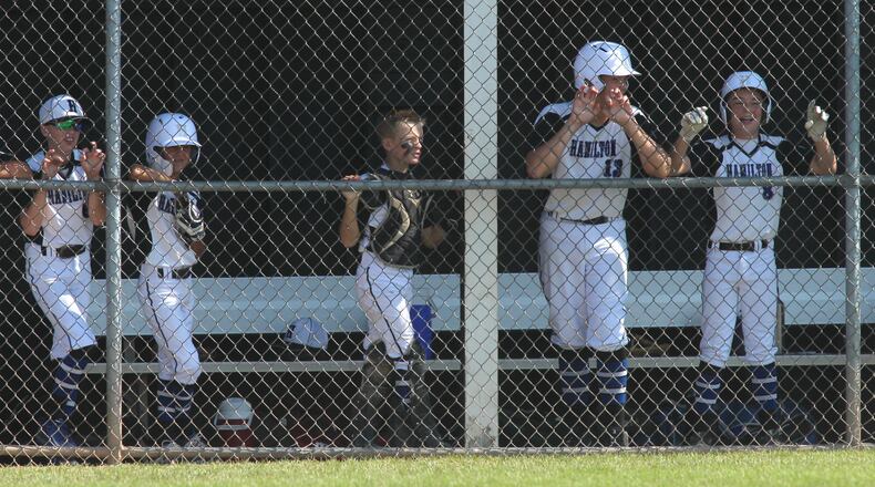 West Side players watch from the dugout during the 2019 Little League state tournament in New Albany. David Jablonski/Staff