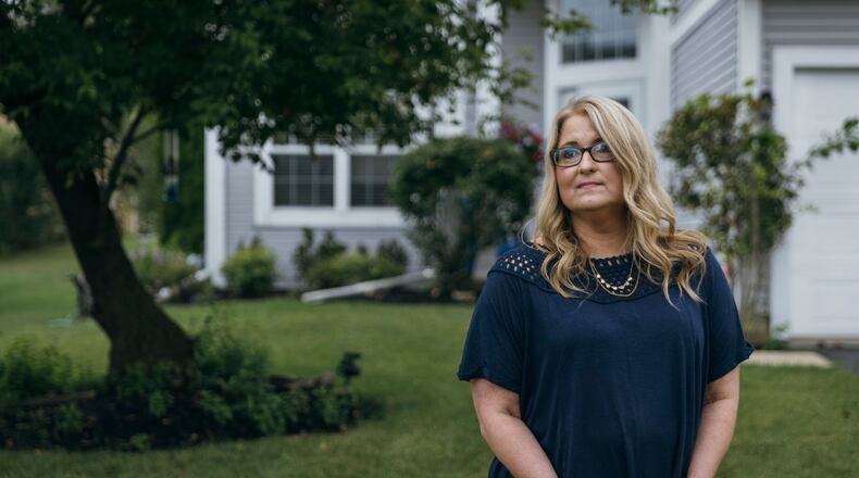 Susan Karnick, who opted for a prophylactic mastectomy when she tested positive for the PALB2 gene. After surgery, it was found she had stage one breast cancer in one breast and five precancerous lesions in the other/ (Taylor Glascock/The New York Times)