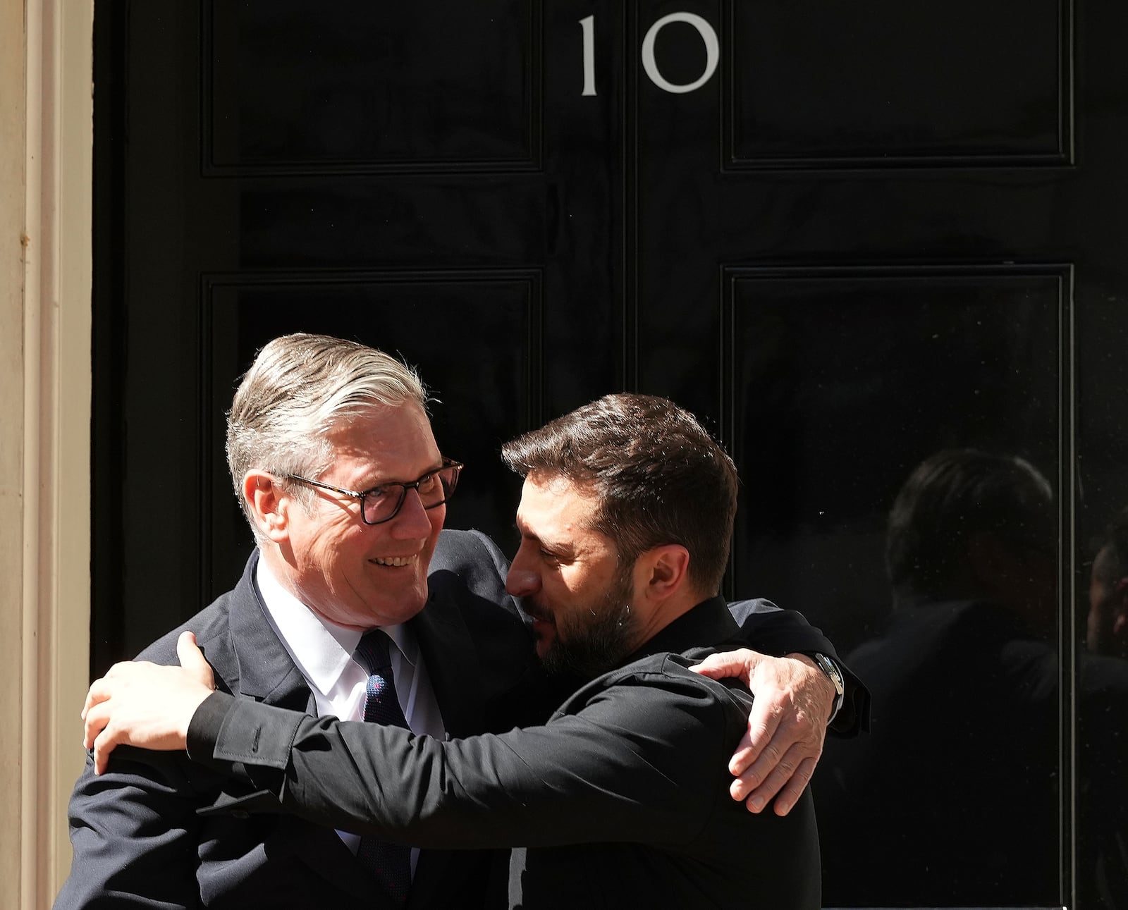 Britain's Prime Minister Keir Starmer welcomes Ukraine's President Volodymyr Zelenskyy to Downing Street in London, Monday, June 23, 2025. (AP Photo/Frank Augstein)