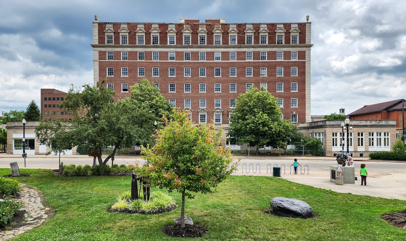 The Well House Hotel in former Anthony Wayne apartments building is expected to be awarded historic Ohio tax credits by the end of June, which will allow the developer to move onto exterior work after July 1. This will create a boutique hotel that will benefit from the activities at Spooky Nook as well as The Fitton Center. A sign on Front Street indicates the road will be closed permanently on July 1. NICK GRAHAM/STAFF