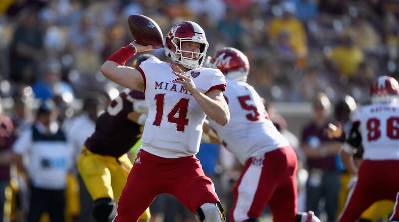 Miami quarterback Gus Ragland s passes the ball against the Minnesota Golden Gophers during the third quarter of the game on September 15, 2018, at TCF Bank Stadium in Minneapolis, Minnesota. (Photo by Hannah Foslien/Getty Images)