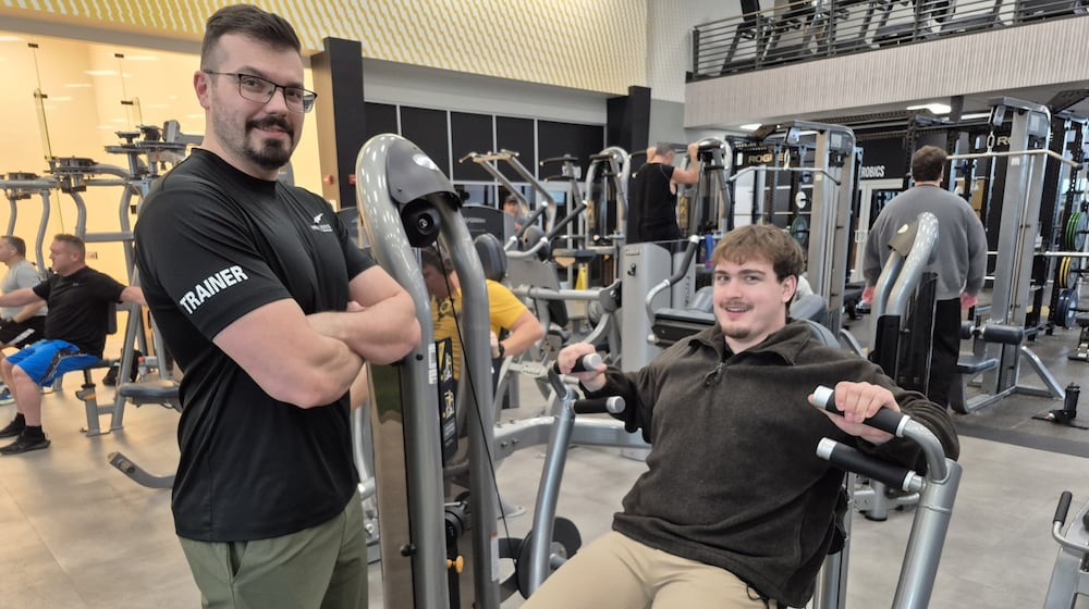 Robert Fleck and Nathan Snyder, personal trainers at LA Fitness in Washington Township, said people trying to get in shape for the new year should have realistic expectations when setting foot in a gym for the first time. MICHAEL KURTZ/STAFF