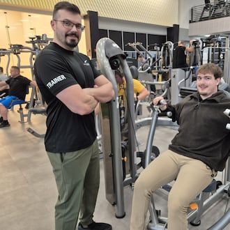 Robert Fleck and Nathan Snyder, personal trainers at LA Fitness in Washington Township, said people trying to get in shape for the new year should have realistic expectations when setting foot in a gym for the first time. MICHAEL KURTZ/STAFF