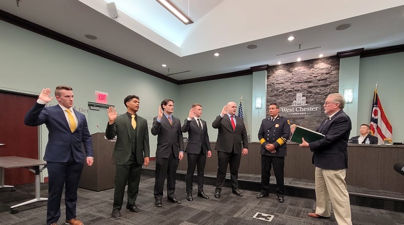 West Chester Twp. hired five more new firefighters in a quest to transition to a full-time career department. Fiscal Officer Bruce Jones swore the men in on Tuesday, they are from left to right the new hires are: Charles Rielage, Levi Bailey, Cody Swall, Jack Rebholz and Sam Thompson.