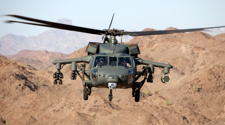 An armed Black Hawk helicopter, powered by General Electric. Lockheed Martin image.