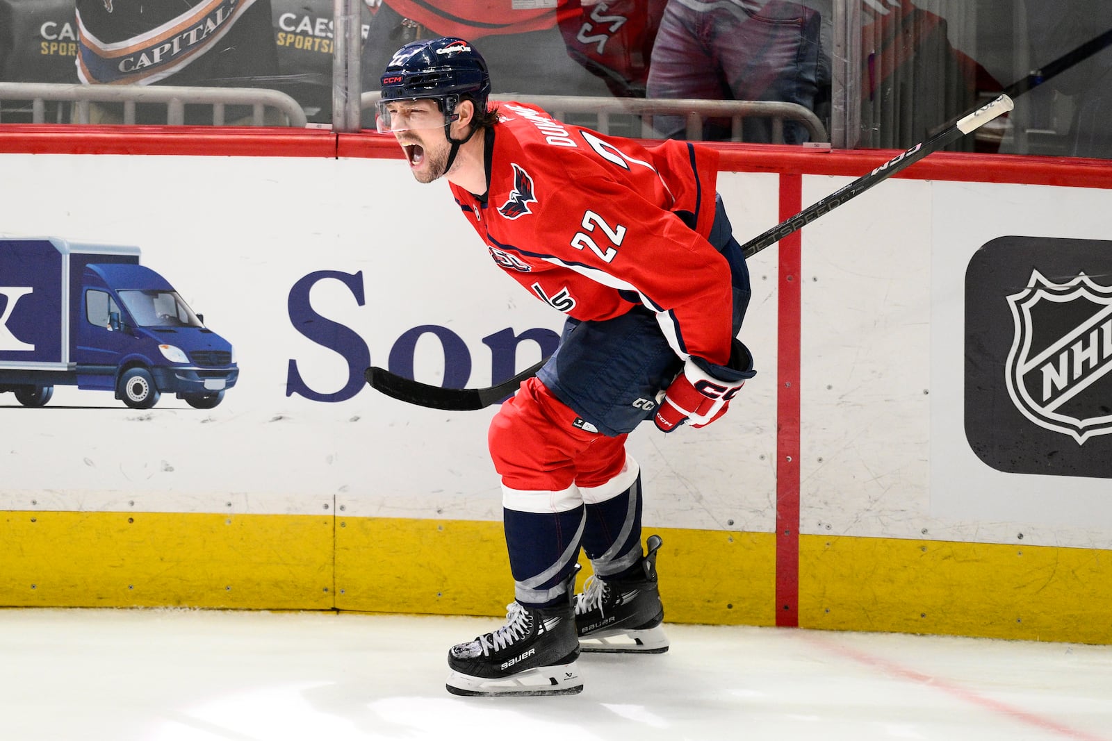 Washington Capitals right wing Brandon Duhaime (22) celebrates his empty net goal in the third period of Game 5 of a first-round NHL hockey playoff series against the Montreal Canadiens Wednesday, April 30, 2025, in Washington. (AP Photo/Nick Wass)
