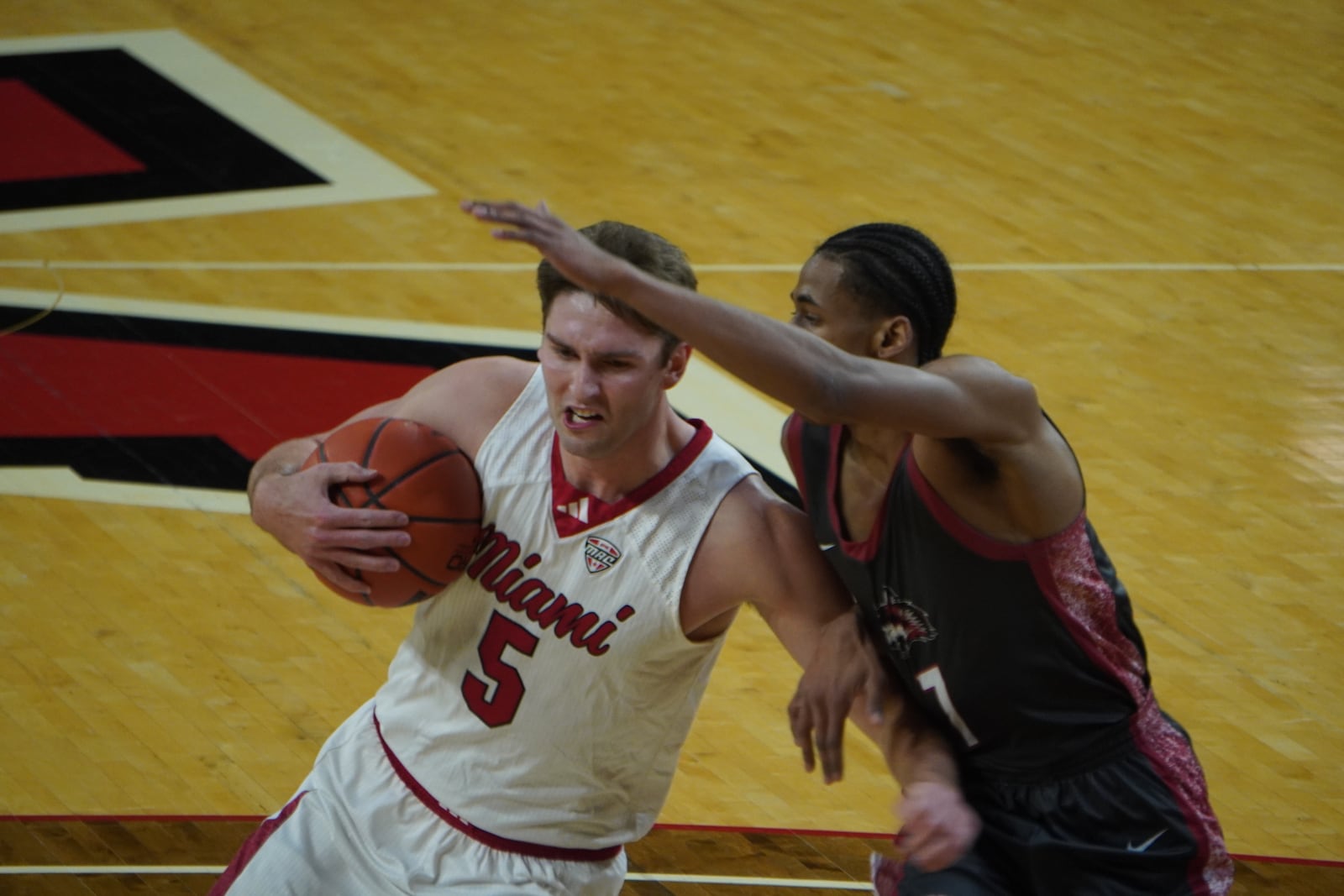 Miami’s Peter Suder drives the lane against Indiana University East on Tuesday night at Millett Hall. CHRIS VOGT / CONTRIBUTING
