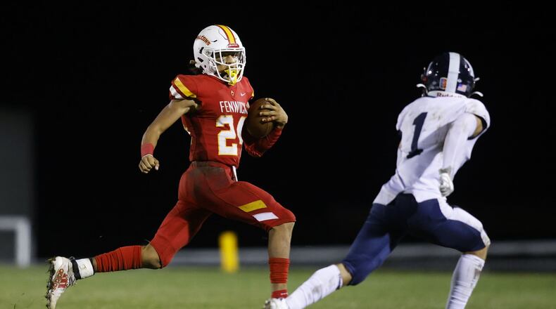 Fenwick's Jude Hooks carries the ball during their football game against Edgewood Friday, Sept. 9, 2022 at Bishop Fenwick High School. Edgewood won 10-0. NICK GRAHAM/STAFF