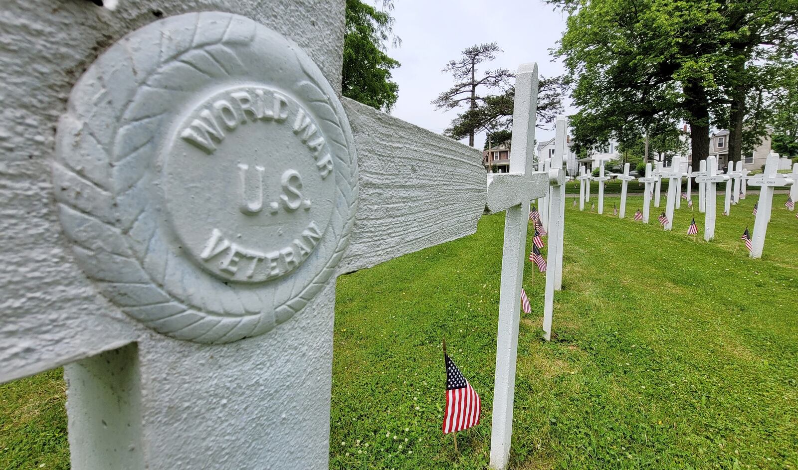This gravestone cross, for a World War I soldier, is at Greenwood Cemetery in Hamilton. NICK GRAHAM/STAFF
