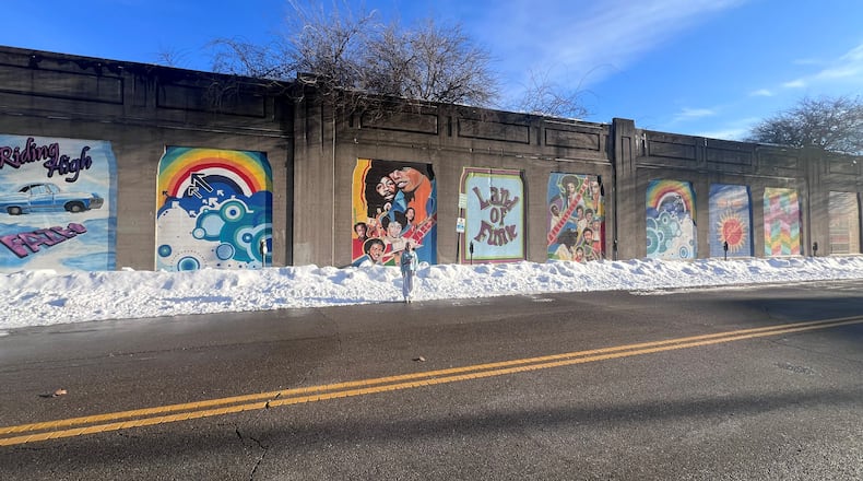 Pamela’s daughter, Jasmine, stands in front of a panel mural on Stone Street in downtown Dayton. The mural, spearheaded by artists Morris Howard and Brittini Long, celebrates Dayton’s role in the funk music movement. CONTRIBUTED/PAMELA CHANDLER