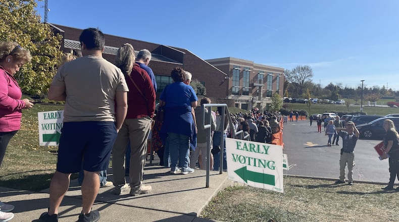 Hundreds of Warren County residents waited in line Sunday at the board of elections in Lebanon on the final day of early voting before the Nov. 5 general election. NICK BLIZZARD/STAFF