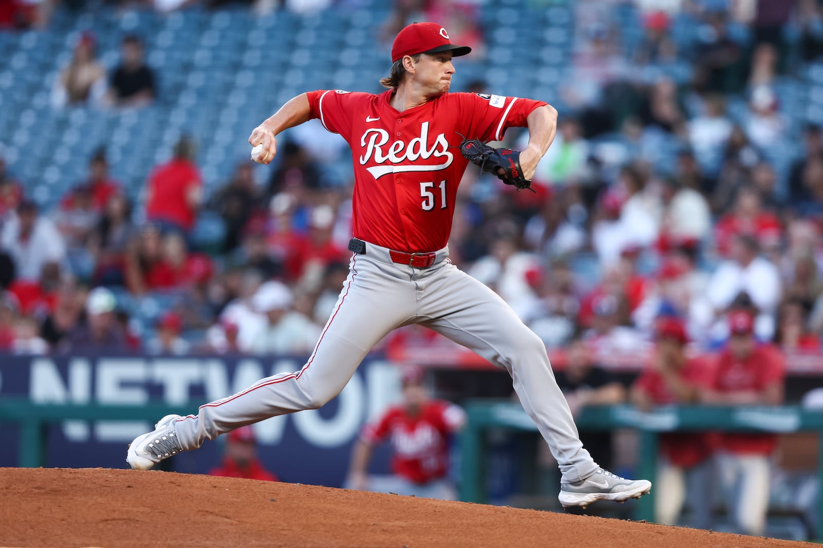 Cincinnati Reds pitcher Brady Singer throws to a Los Angeles Angels batter during the first inning of a baseball game, Monday, Aug. 18, 2025, in Anaheim, Calif. (AP Photo/Jessie Alcheh)