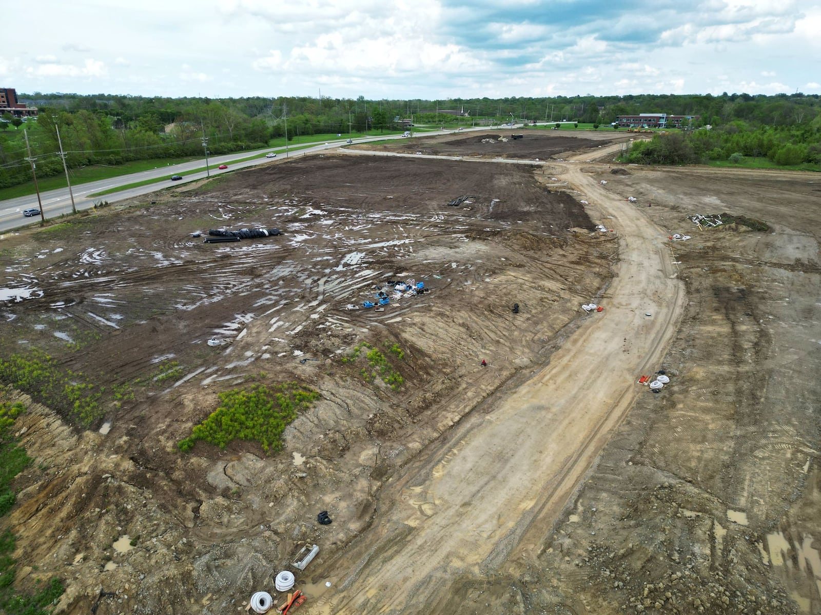 Infrastructure work is near completion for a proposed 160,000-square-foot multipurpose event center along Interstate 75 on the east side of Middletown at Ohio 122 and Union Road, shown by aerial view Friday, May 2, 2025. NICK GRAHAM/STAFF