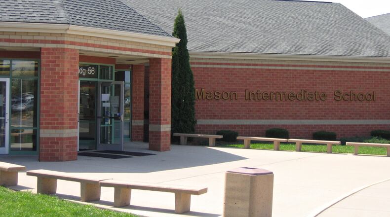 Mason school officials released a statement to school parents this week saying the students identified in the vandalism of the playground at Mason Intermediate School are being punished after an investigation using school security camera footage. Some of the students drew a Nazi symbol in chalk on the playground surface along with profanity, say school officials. (File Photo\Journal-News)