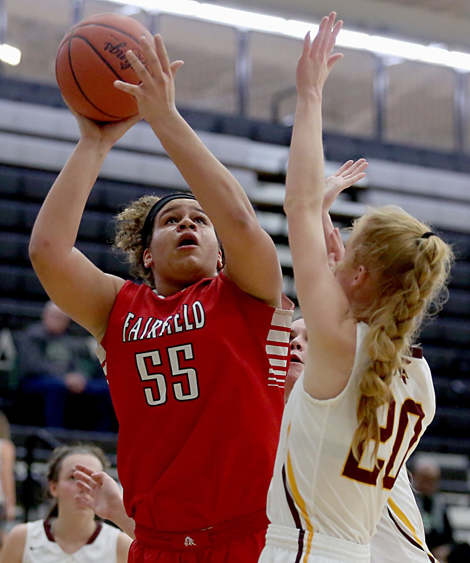 Fairfield forward Maddie Schaeffer puts up a shot against Turpin guard Ellie Holt on Thursday night during a Division I sectional semifinal at Lakota East. CONTRIBUTED PHOTO BY E.L. HUBBARD