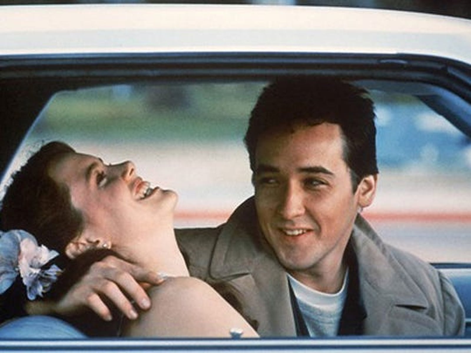 Ione Skye and John Cusack get a little closer in a scene from “Say Anything.” 20TH CENTURY FOX