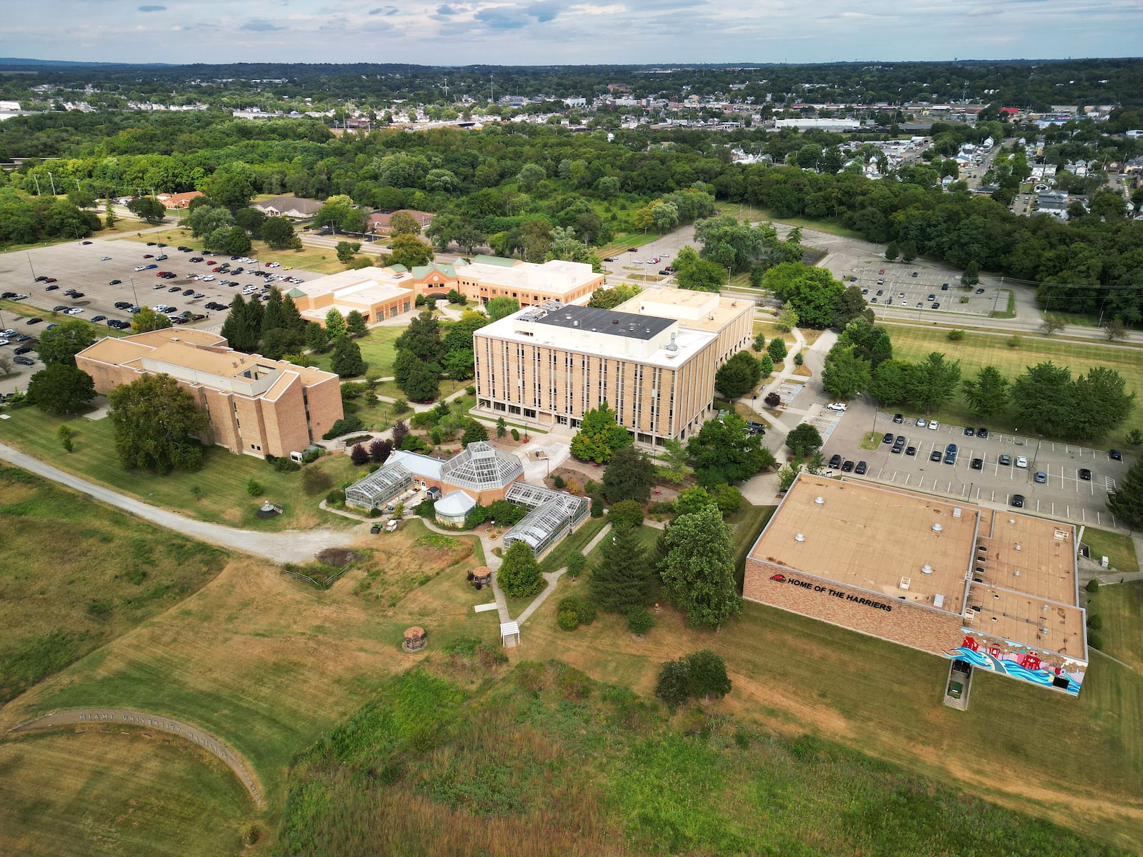 As part of Miami University's polytechnic initiative, the school is considering adding student housing to its Hamilton campus. University leaders believe the polytechnic programming will attract more students out of the region, which could necessitate the need for student housing. Pictured is the Miami Hamilton campus in August 2025. NICK GRAHAM / FILE