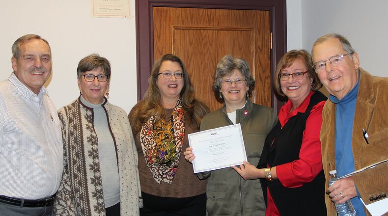 Celebrating the acceptance of the Oxford community into the AARP Network of Age-Friendly Communities are members of City Council and the Oxford VillAGE Network Steering Committee (from left) Steve Schnabl, Catherine Hollins, Jessie Leek, Mayor Kate Rousmaniere, Ann Whelpton and Steve Dana. CONTRIBUTED