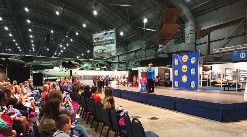 Retired NASA astronaut and United States Air Force (USAF) Col. Eileen Collins talks to participants in Girls in Aviation Day at the National Museum of the U.S. Air Force on Sunday. Collins discussed the science behind launching the Space Shuttle, as well as what the experience was like being in space. SAMANTHA WILDOW/STAFF