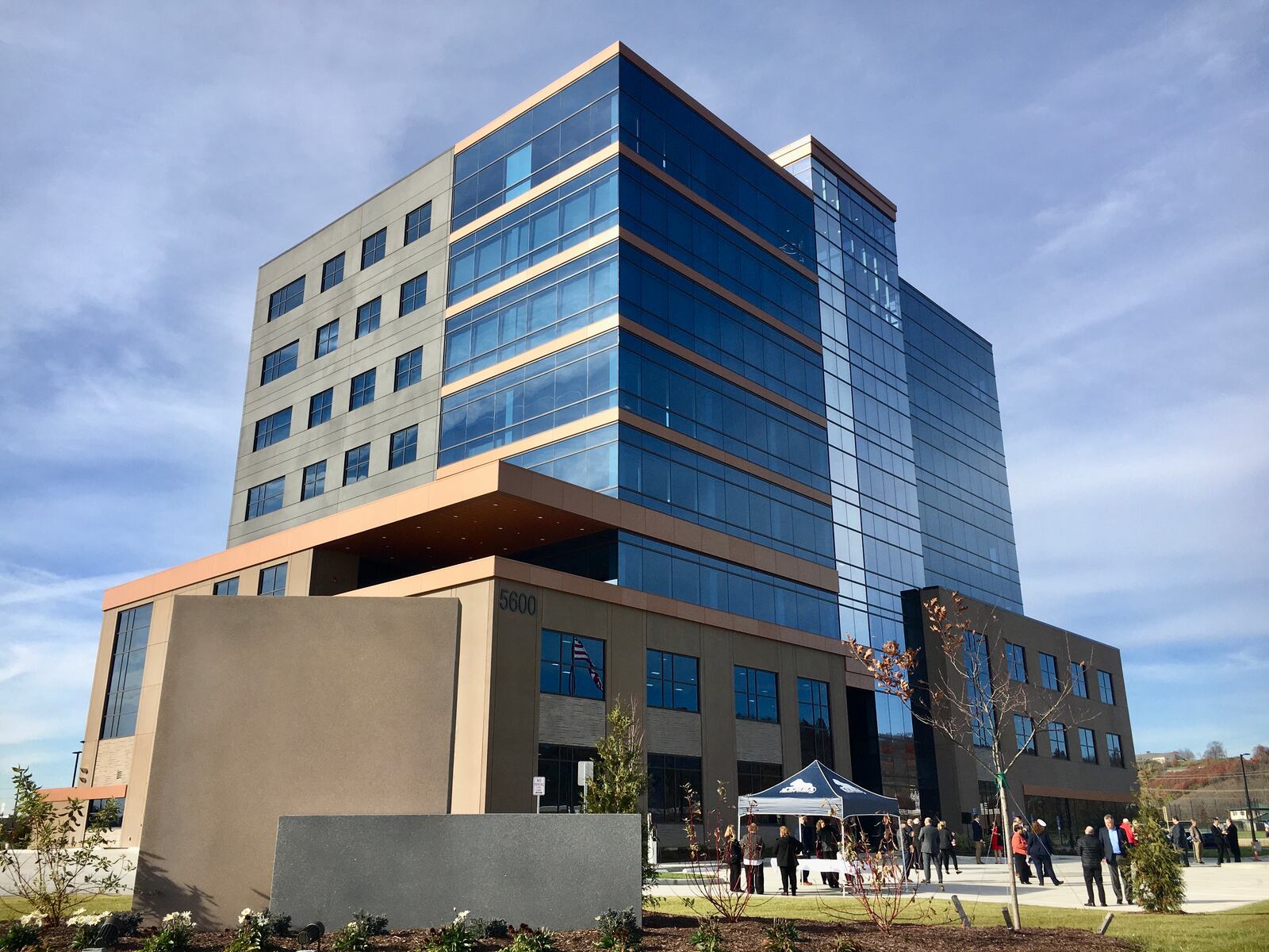 The $28 million Kemba Credit Union office building was dedicated with a flag-raising ceremony Tuesday attended by local and Butler County officials. The eight-story plus office building is now the tallest in the township and officials say it represents the continued, upward growth of the booming business community. (Photo By Michael D. Clark\Journal-News)